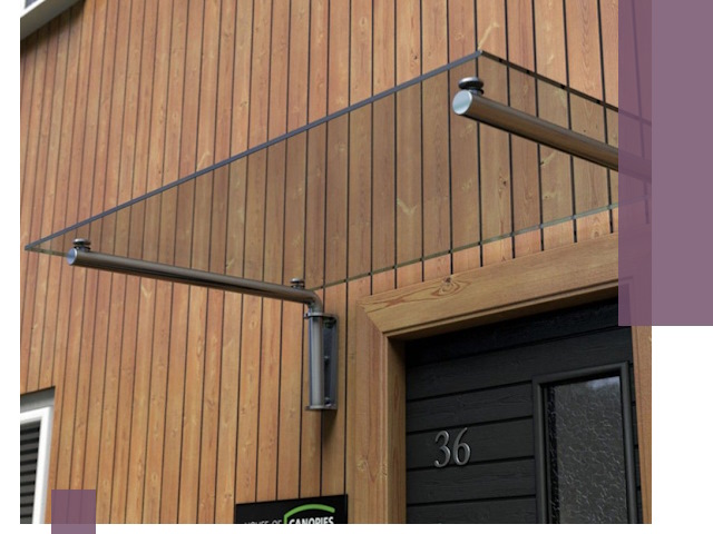 Стеклянные козырьки на входы и фасады в Лесне